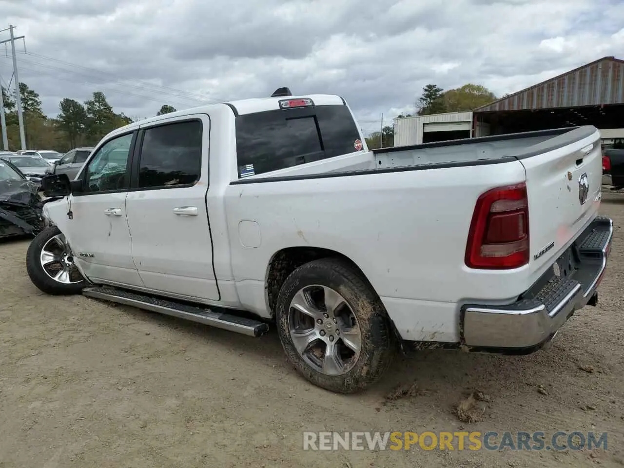 2 Photograph of a damaged car 1C6SRFJT0PN596676 RAM 1500 2023
