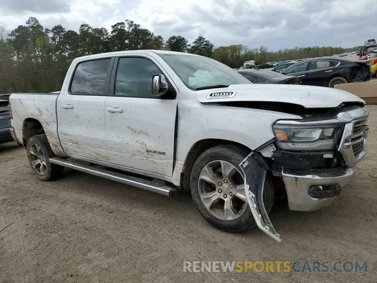 4 Photograph of a damaged car 1C6SRFJT0PN596676 RAM 1500 2023
