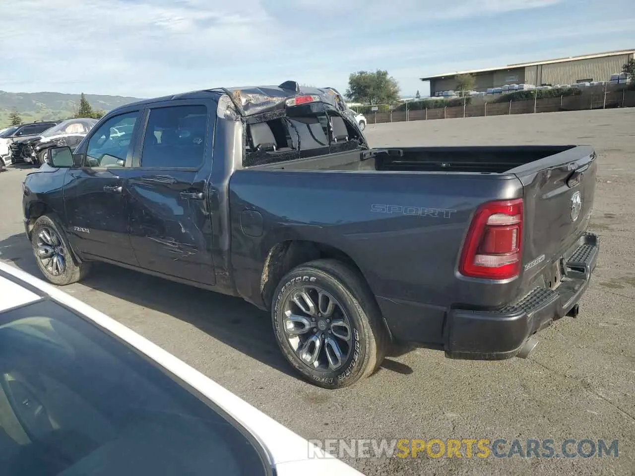 2 Photograph of a damaged car 1C6SRFJT0PN658710 RAM 1500 2023