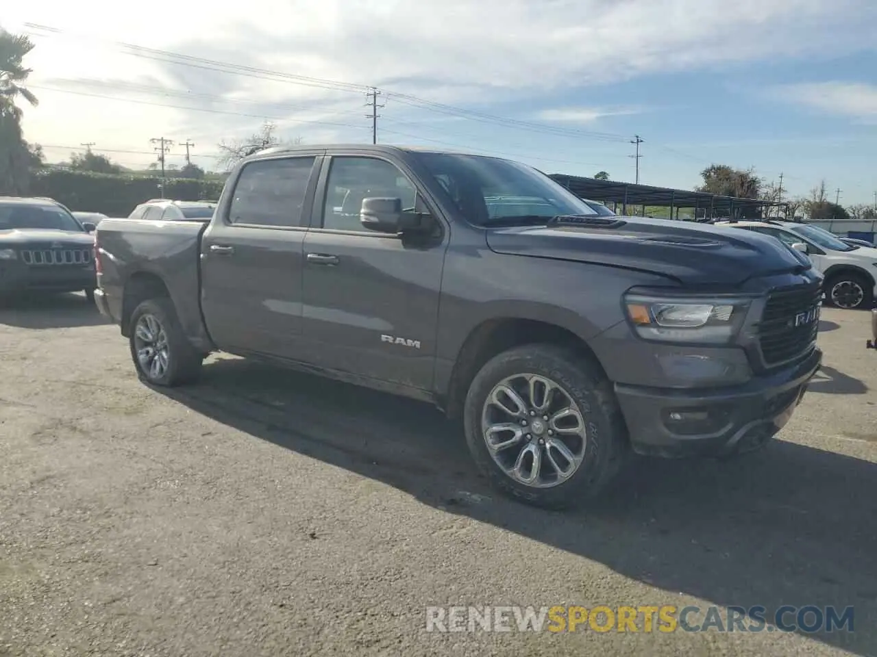 4 Photograph of a damaged car 1C6SRFJT0PN658710 RAM 1500 2023