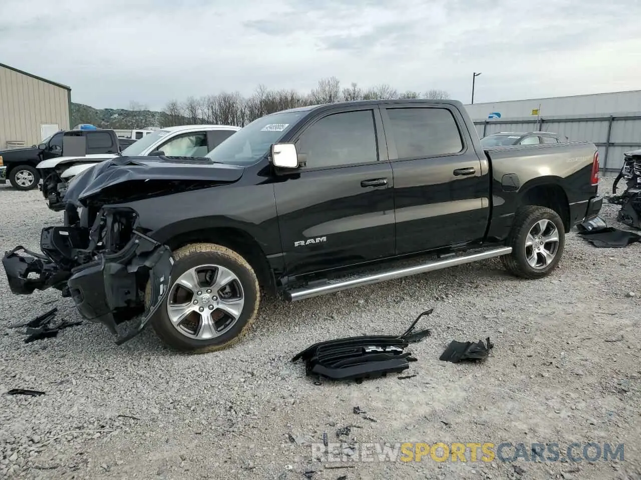 1 Photograph of a damaged car 1C6SRFJT3PN517002 RAM 1500 2023