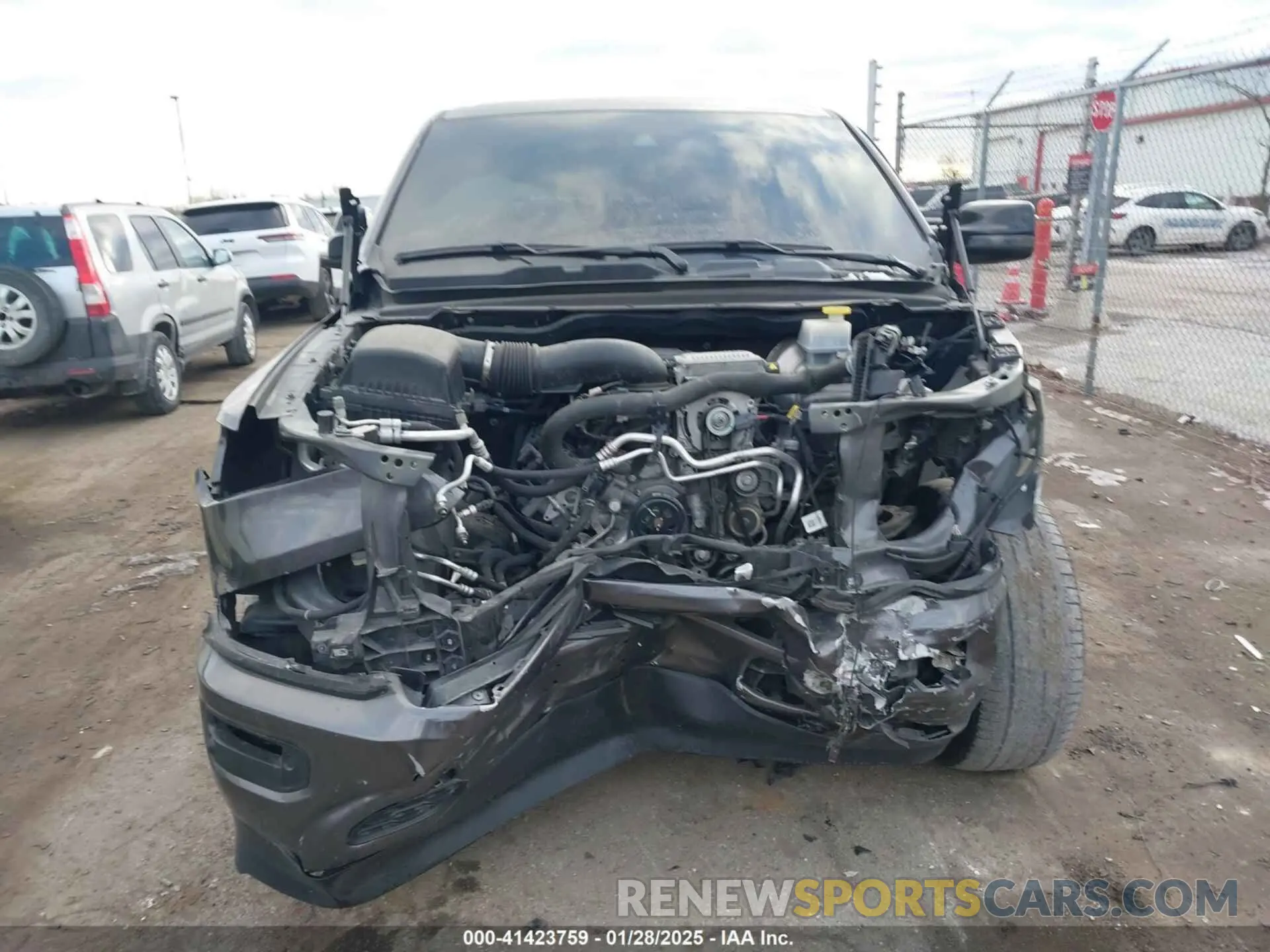 12 Photograph of a damaged car 1C6SRFJT3PN573439 RAM 1500 2023