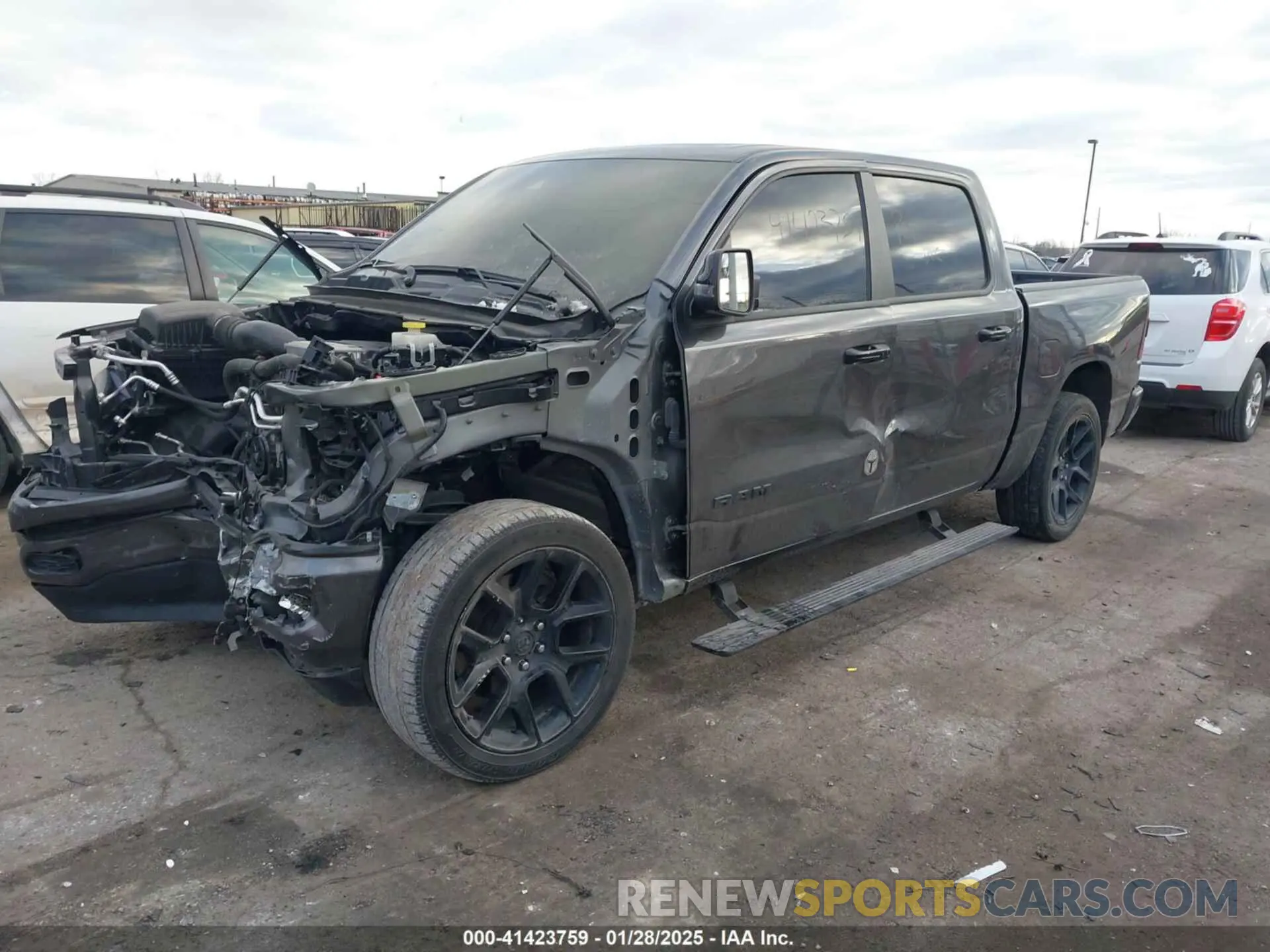 2 Photograph of a damaged car 1C6SRFJT3PN573439 RAM 1500 2023