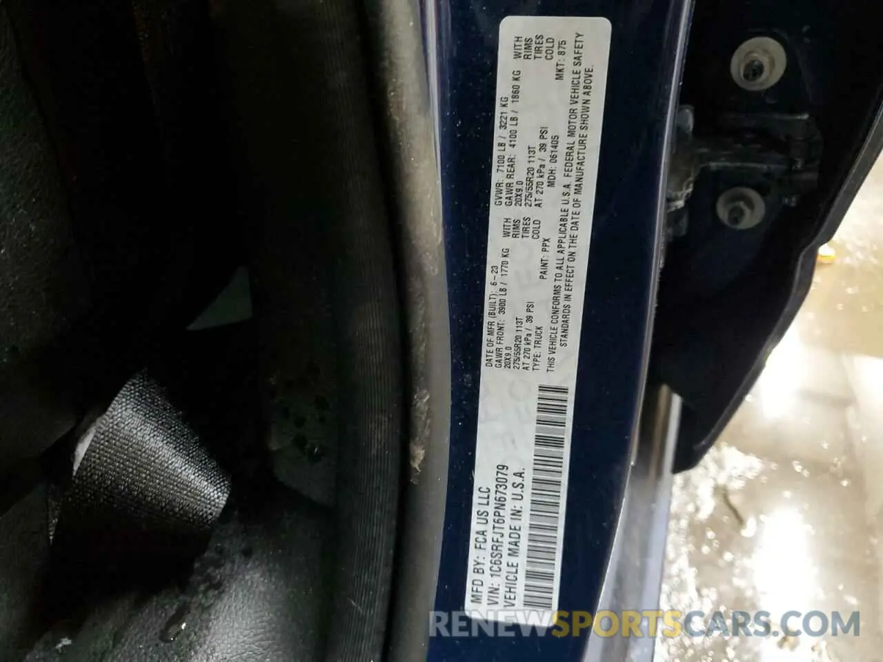 12 Photograph of a damaged car 1C6SRFJT6PN673079 RAM 1500 2023