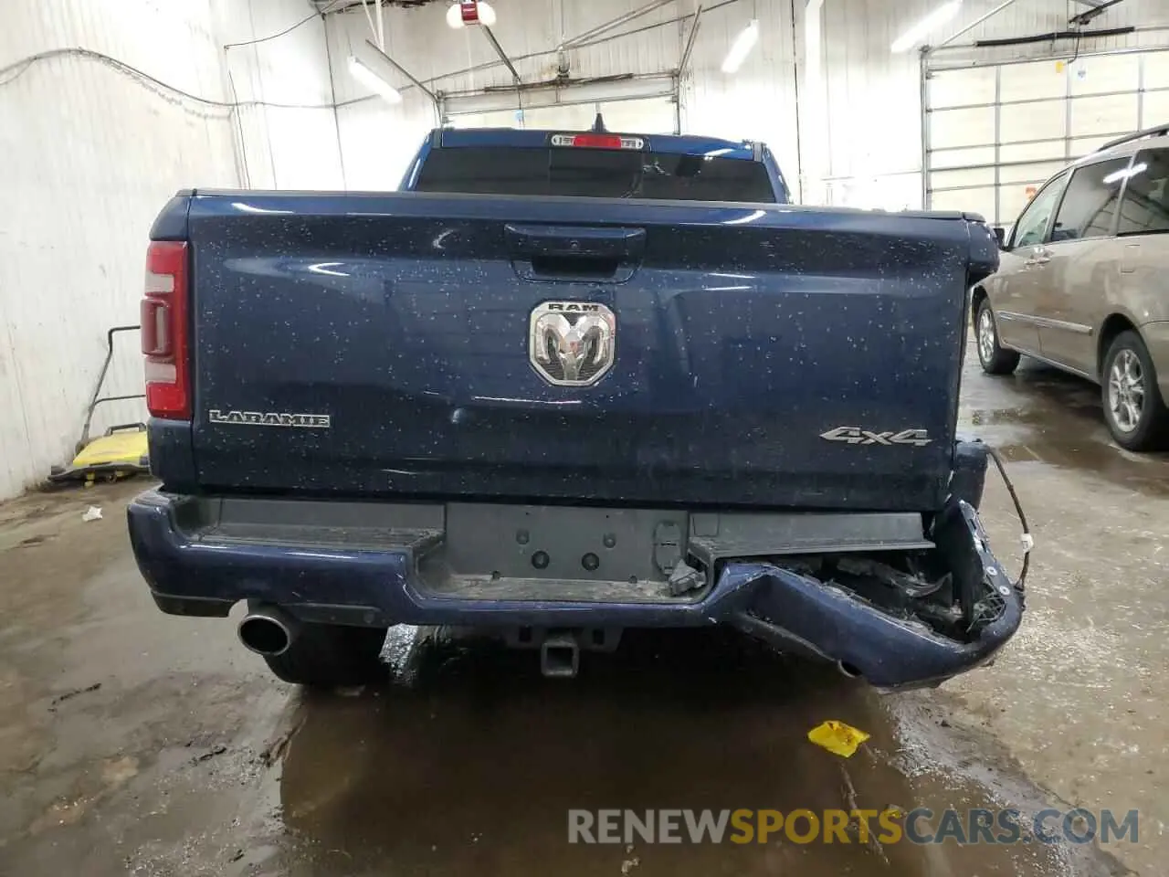 6 Photograph of a damaged car 1C6SRFJT6PN673079 RAM 1500 2023