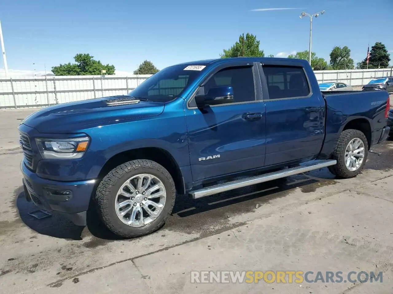1 Photograph of a damaged car 1C6SRFJT7PN639488 RAM 1500 2023