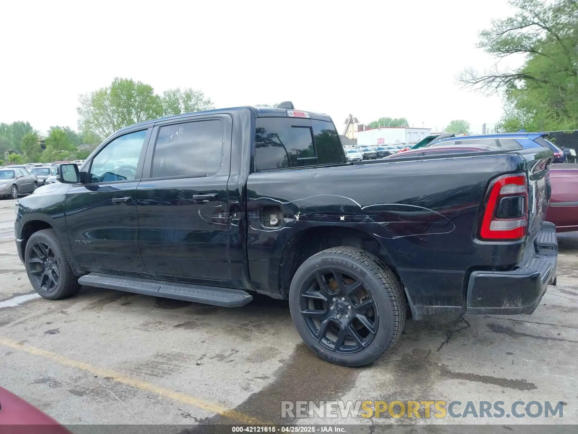14 Photograph of a damaged car 1C6SRFJTXPN541328 RAM 1500 2023