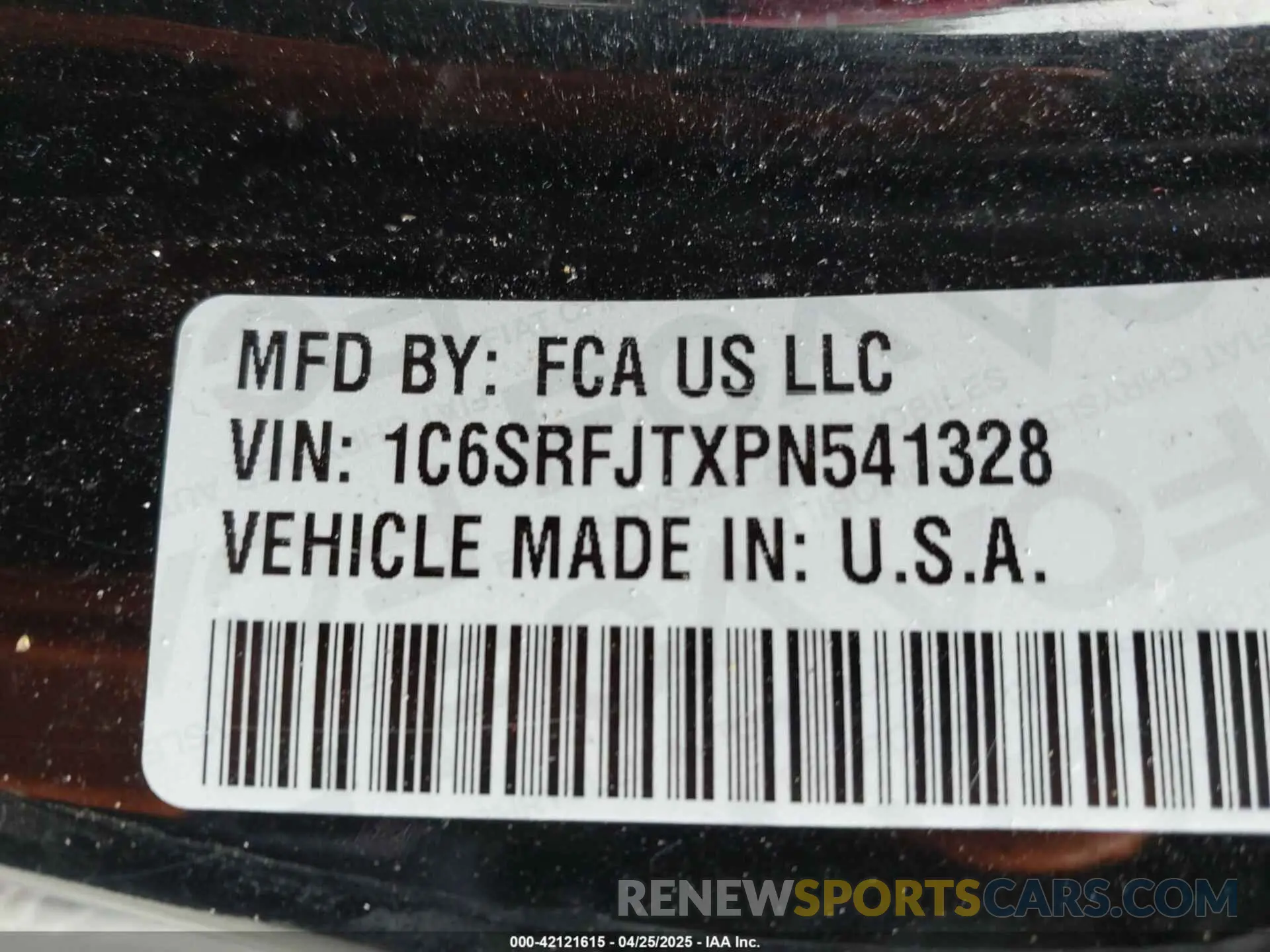 9 Photograph of a damaged car 1C6SRFJTXPN541328 RAM 1500 2023