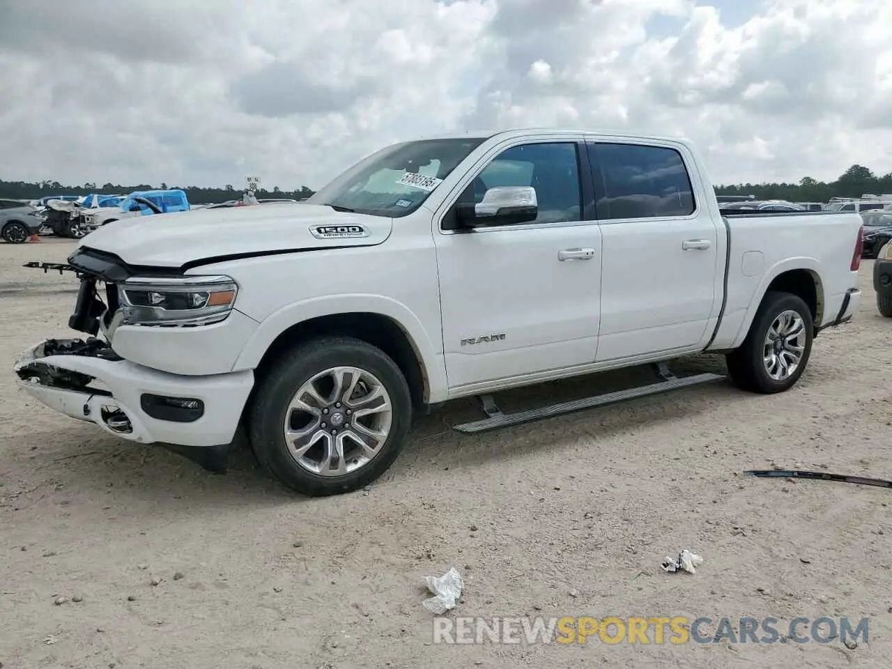 1 Photograph of a damaged car 1C6SRFKT0PN509986 RAM 1500 2023