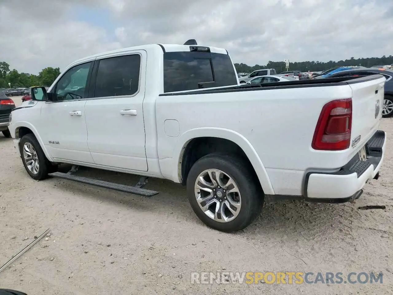 2 Photograph of a damaged car 1C6SRFKT0PN509986 RAM 1500 2023