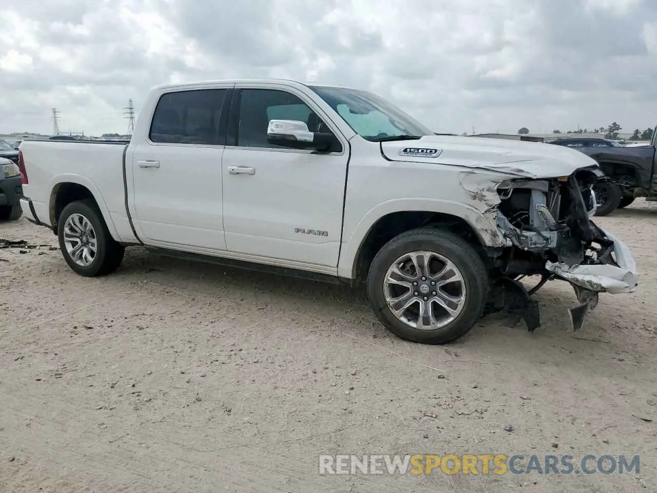 4 Photograph of a damaged car 1C6SRFKT0PN509986 RAM 1500 2023
