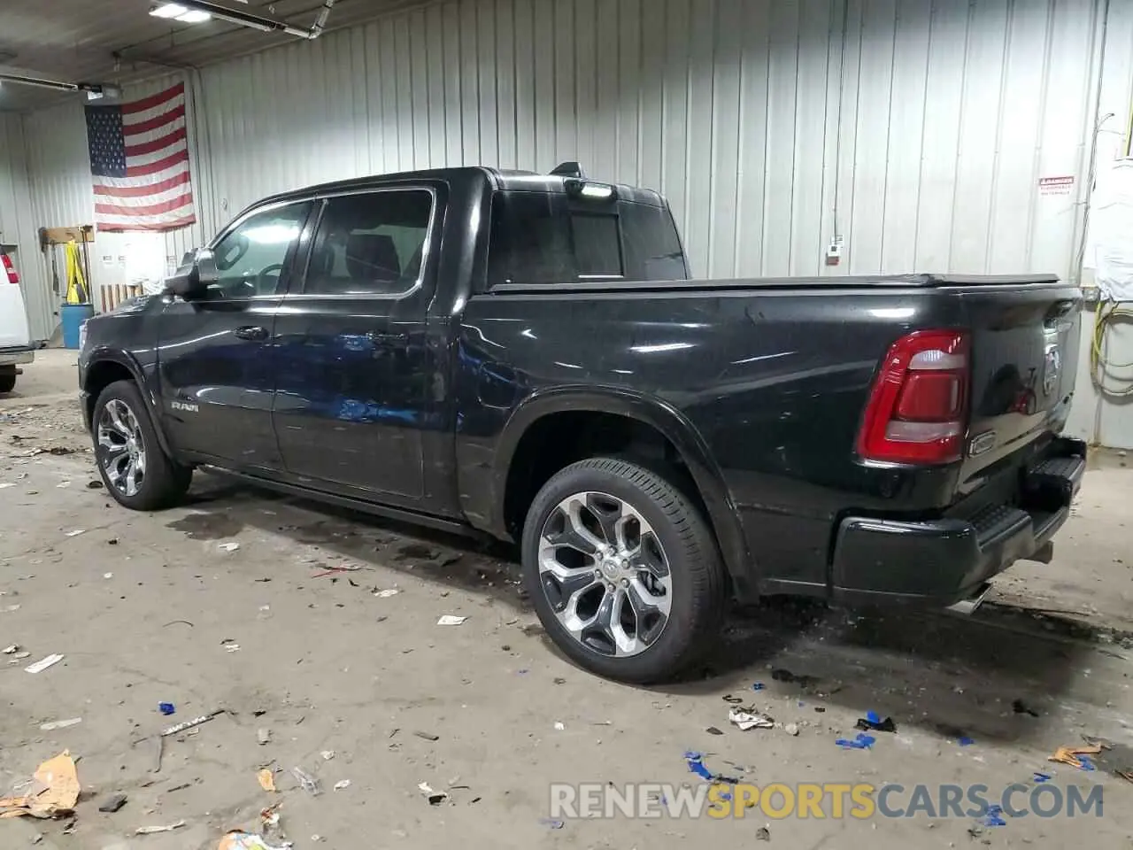 2 Photograph of a damaged car 1C6SRFKT9PN689128 RAM 1500 2023