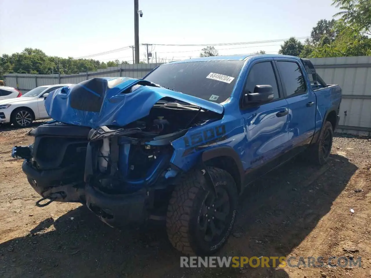 1 Photograph of a damaged car 1C6SRFLT5PN590742 RAM 1500 2023