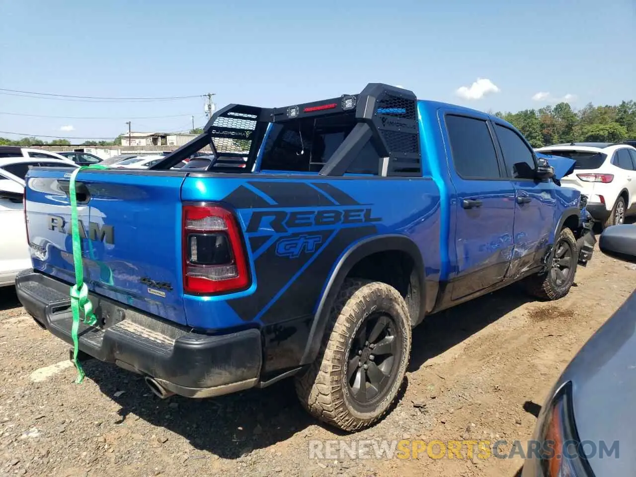 3 Photograph of a damaged car 1C6SRFLT5PN590742 RAM 1500 2023