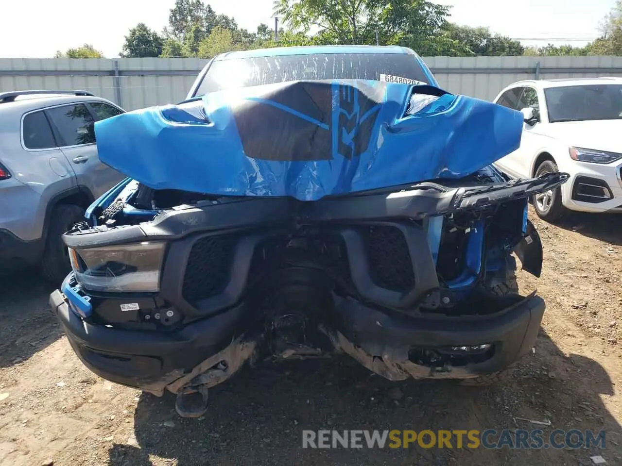 5 Photograph of a damaged car 1C6SRFLT5PN590742 RAM 1500 2023