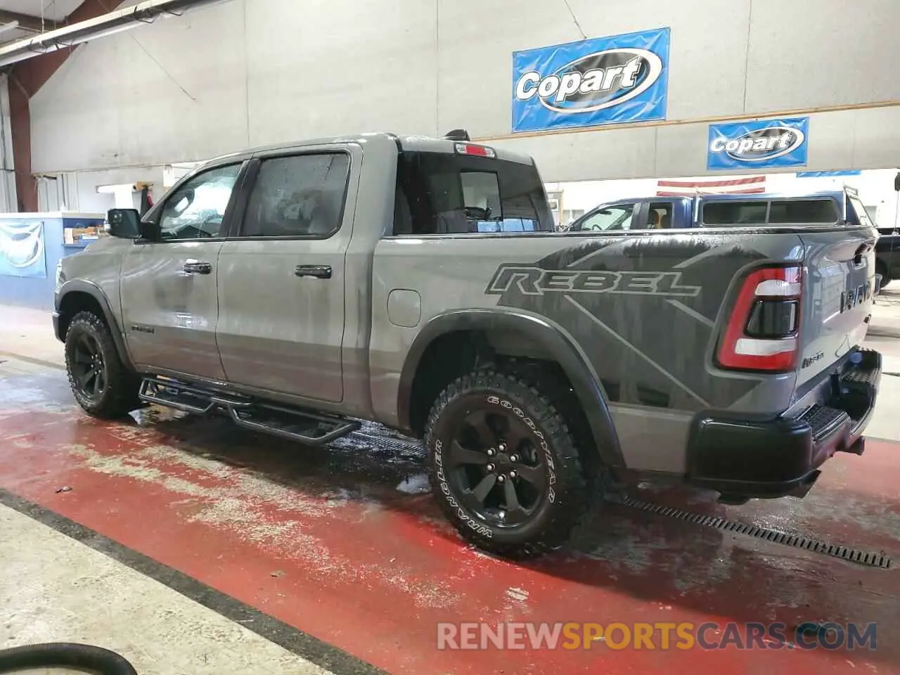 2 Photograph of a damaged car 1C6SRFLT7PN670947 RAM 1500 2023