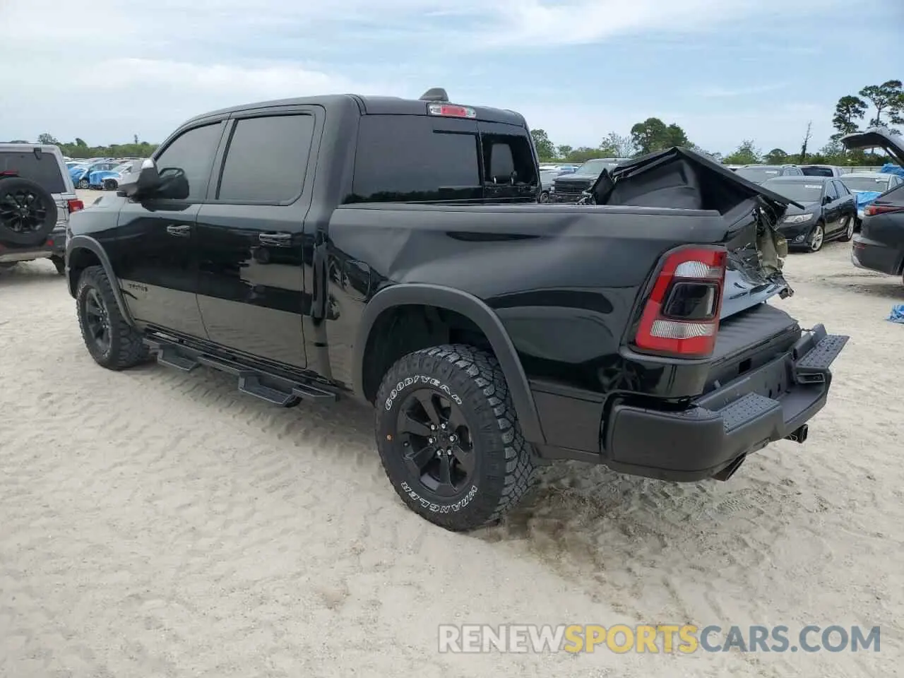 2 Photograph of a damaged car 1C6SRFLT8PN609879 RAM 1500 2023