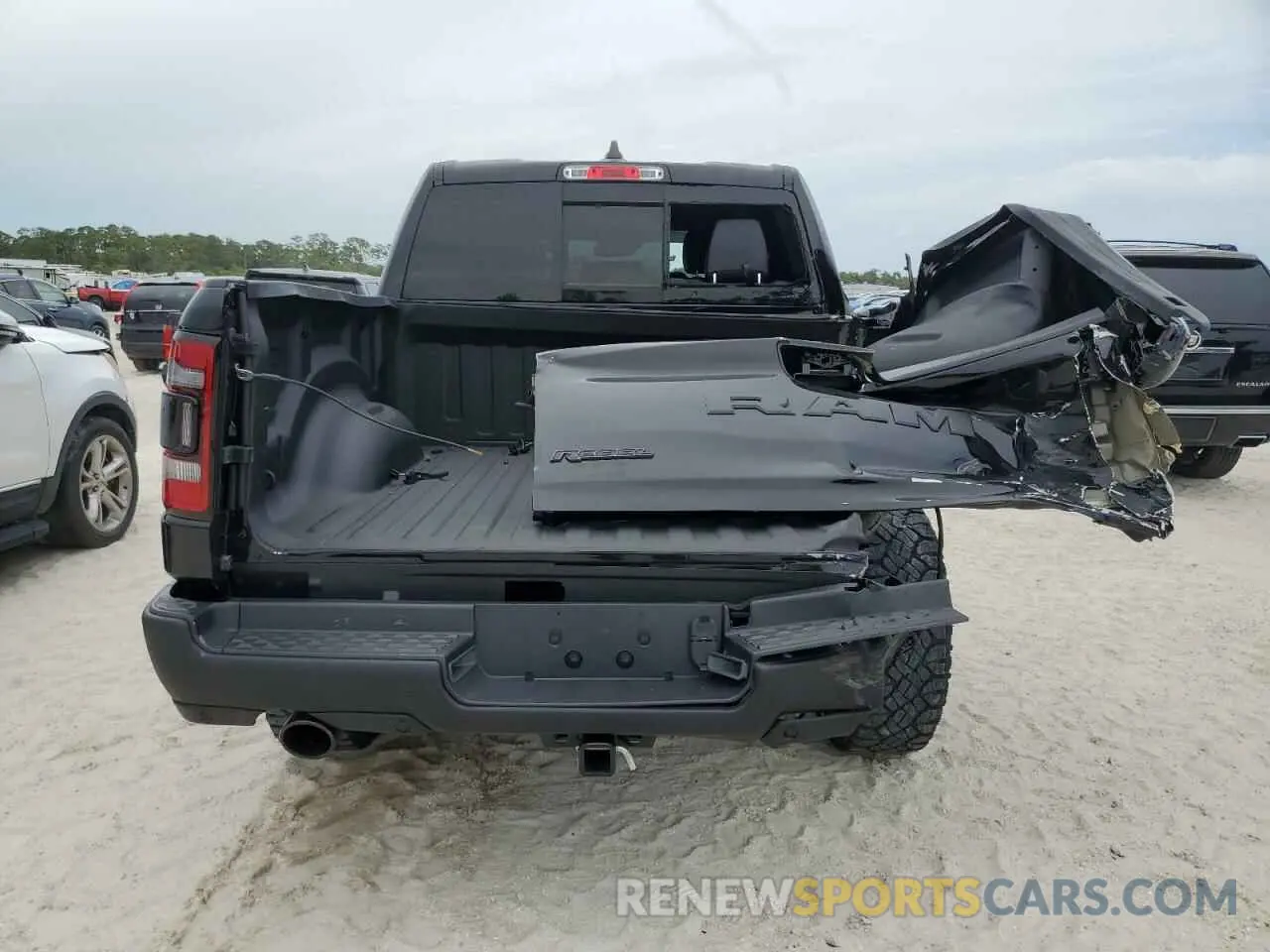 6 Photograph of a damaged car 1C6SRFLT8PN609879 RAM 1500 2023