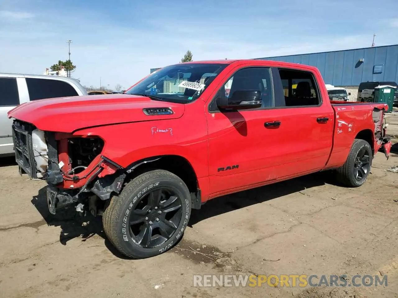 1 Photograph of a damaged car 1C6SRFMT6PN697815 RAM 1500 2023