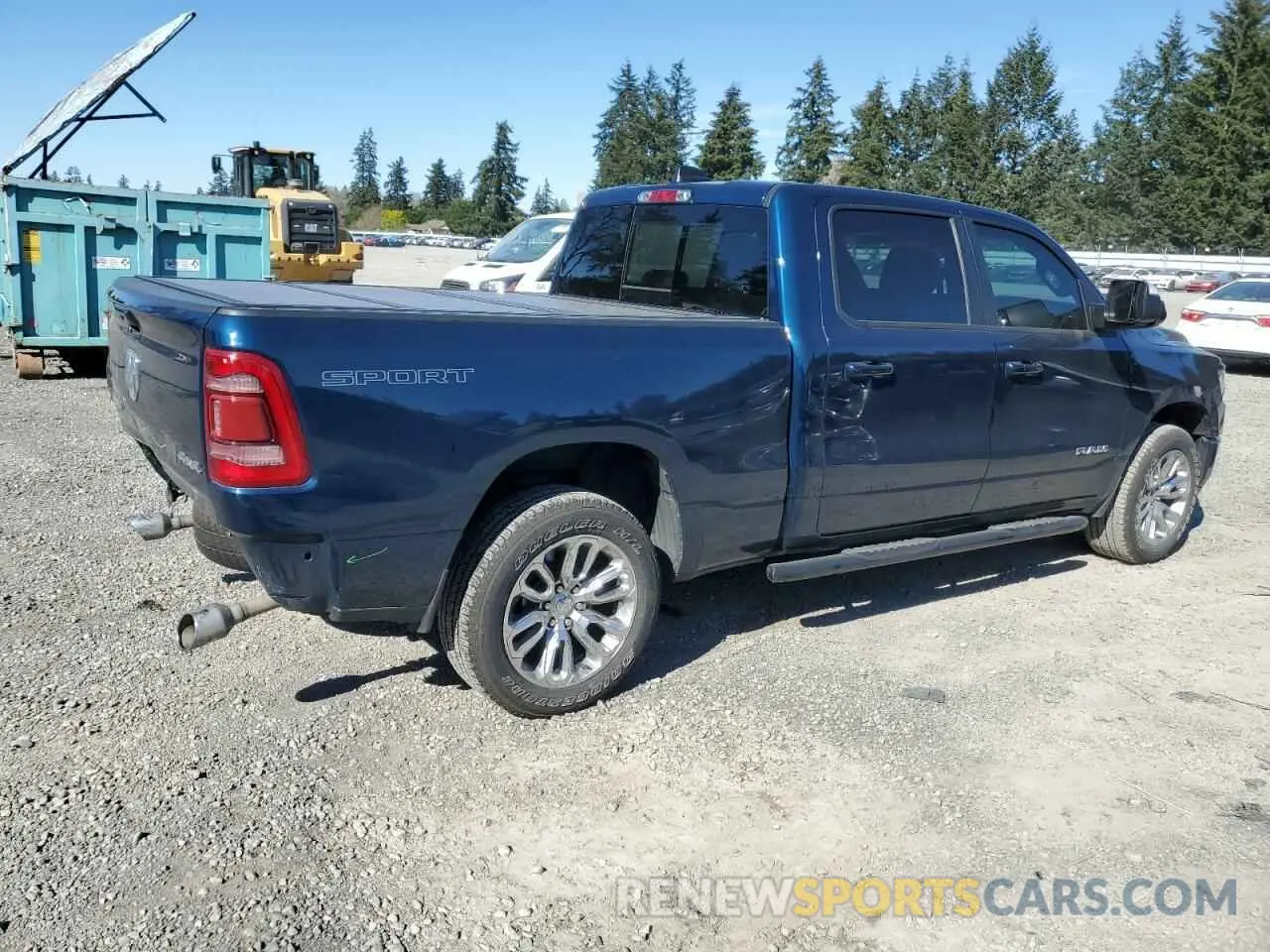 3 Photograph of a damaged car 1C6SRFRT1PN589871 RAM 1500 2023