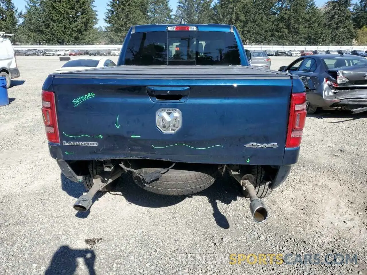 6 Photograph of a damaged car 1C6SRFRT1PN589871 RAM 1500 2023