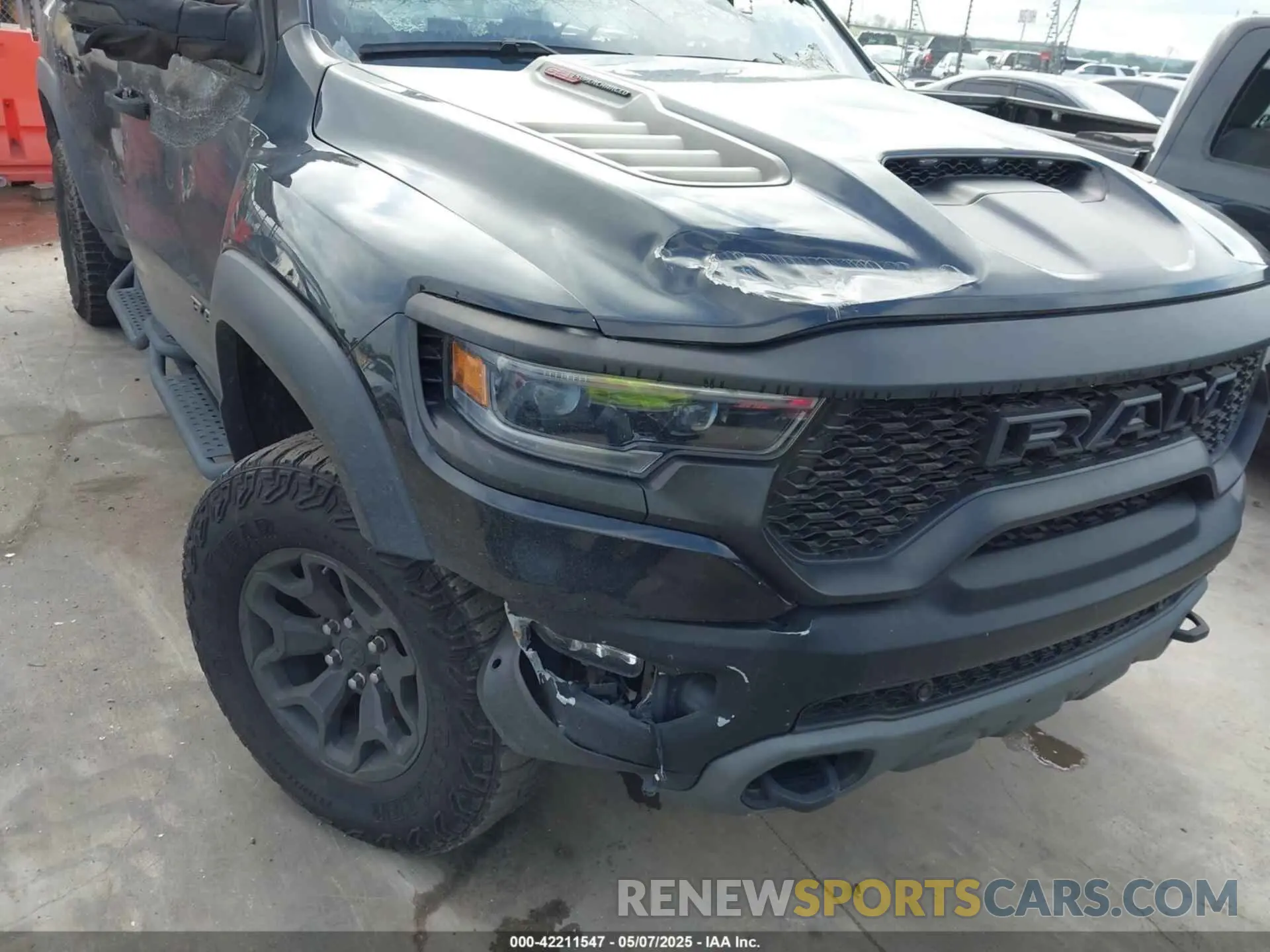 12 Photograph of a damaged car 1C6SRFU94PN509443 RAM 1500 2023