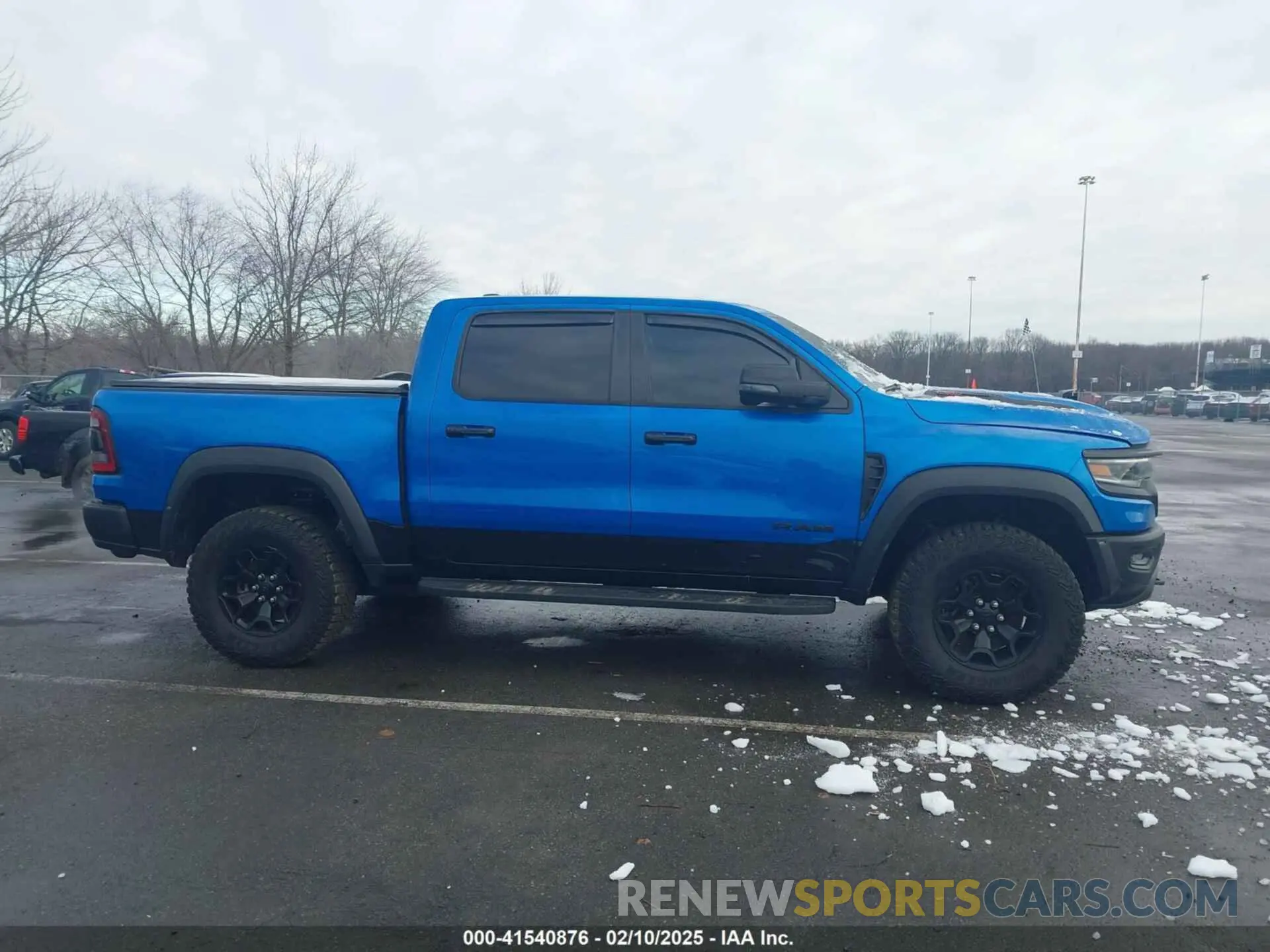 13 Photograph of a damaged car 1C6SRFU98PN529971 RAM 1500 2023