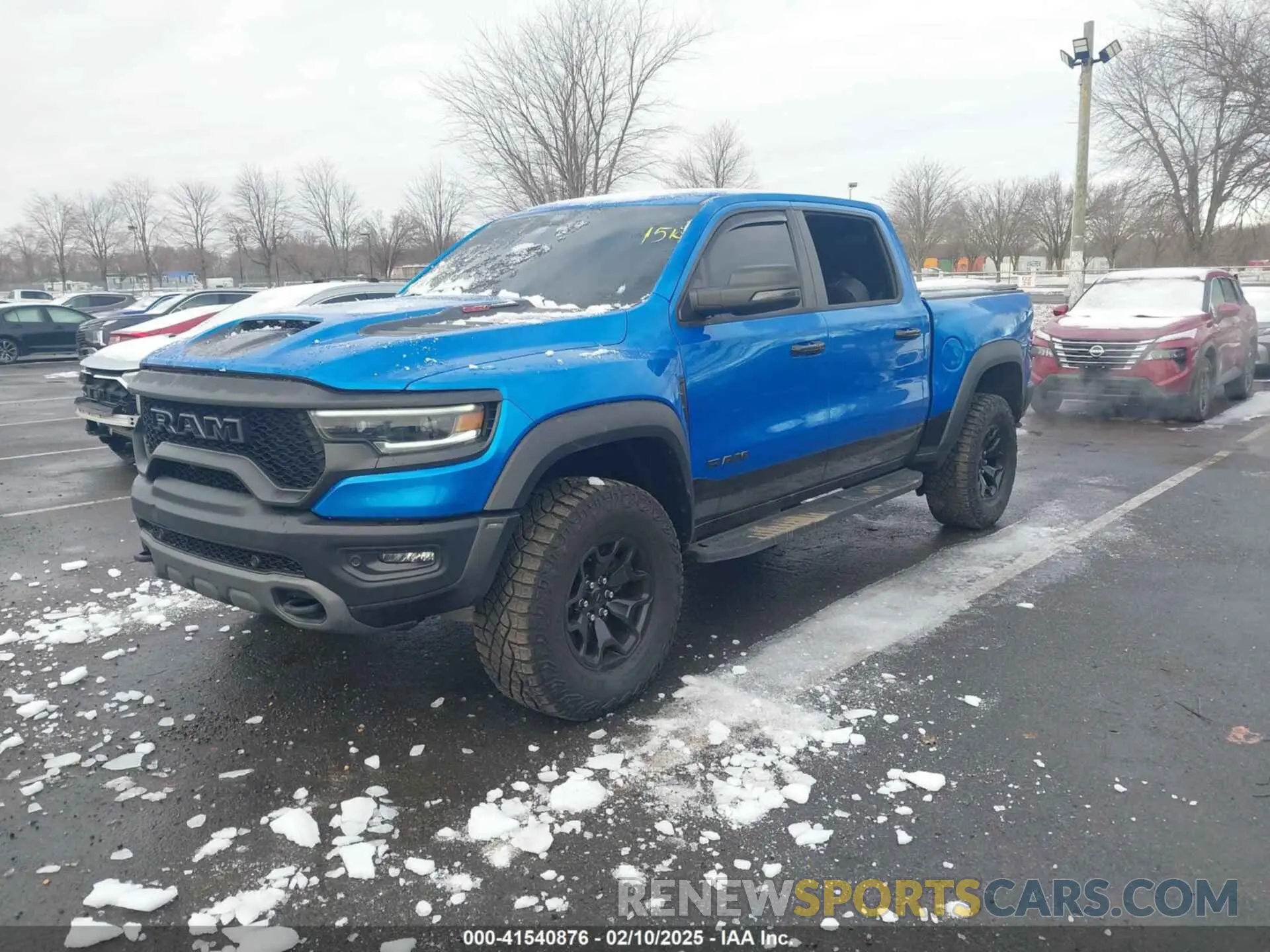 2 Photograph of a damaged car 1C6SRFU98PN529971 RAM 1500 2023