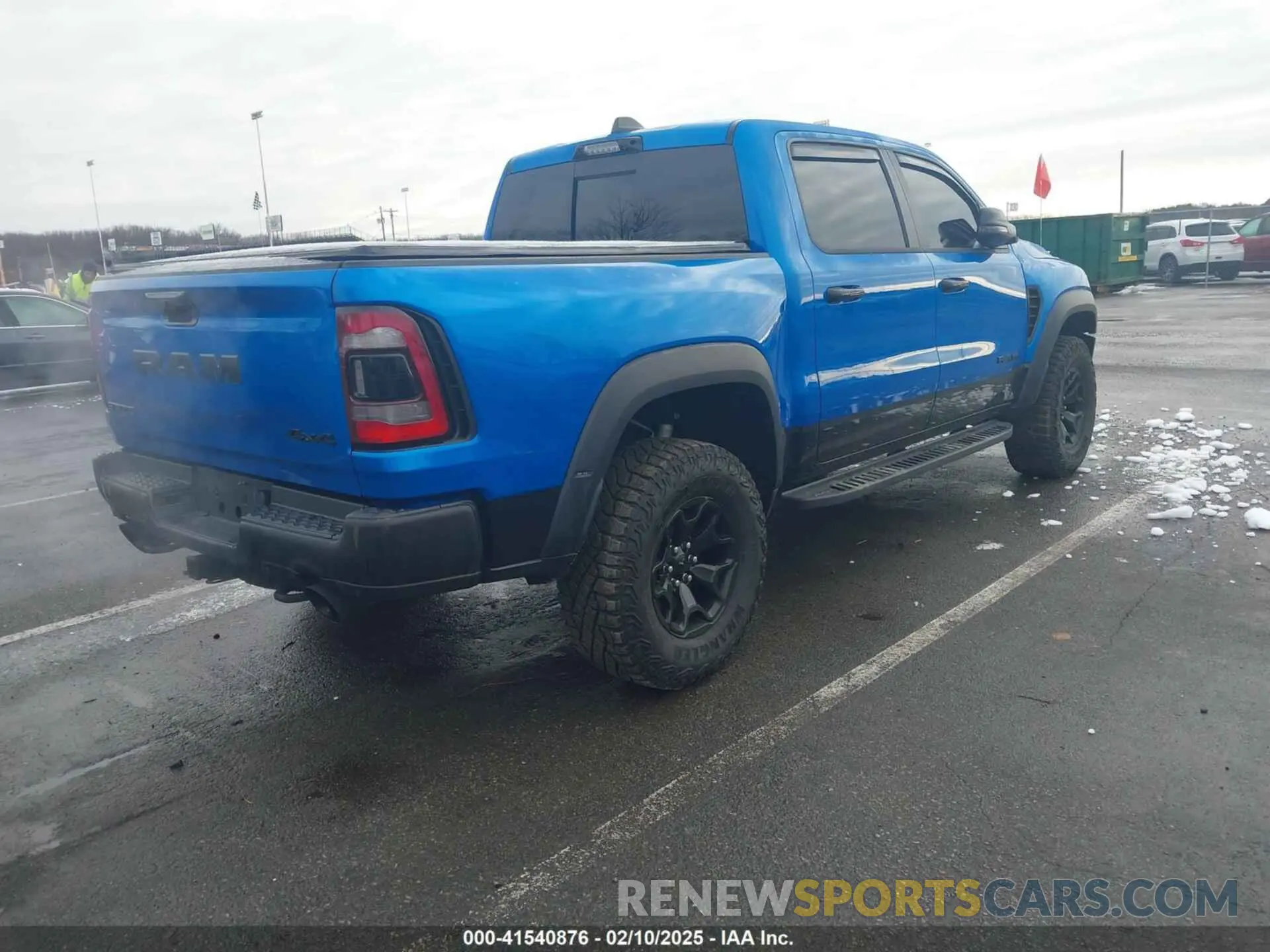 4 Photograph of a damaged car 1C6SRFU98PN529971 RAM 1500 2023