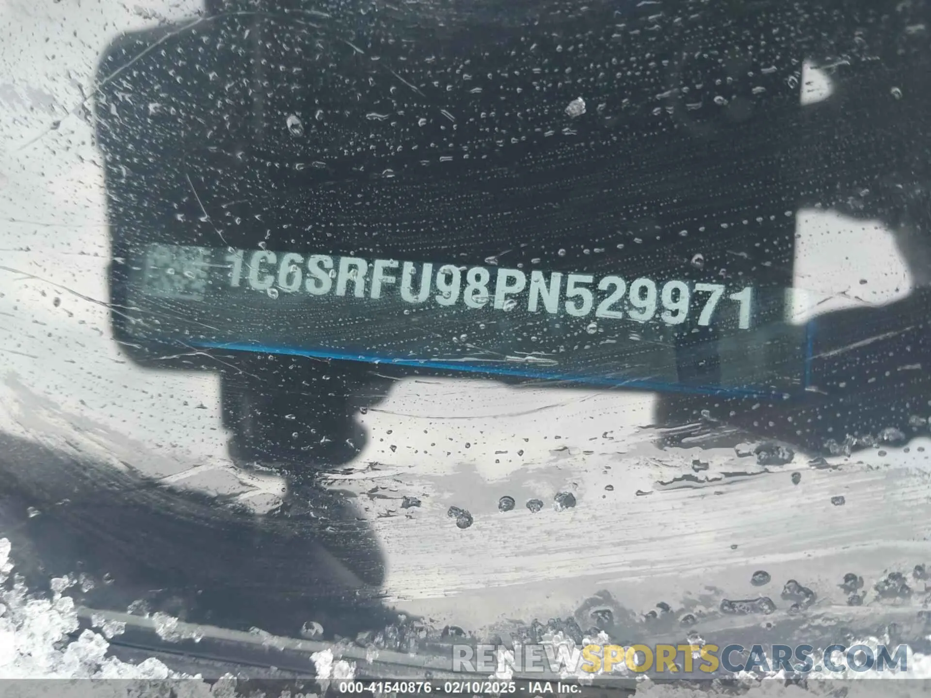 9 Photograph of a damaged car 1C6SRFU98PN529971 RAM 1500 2023