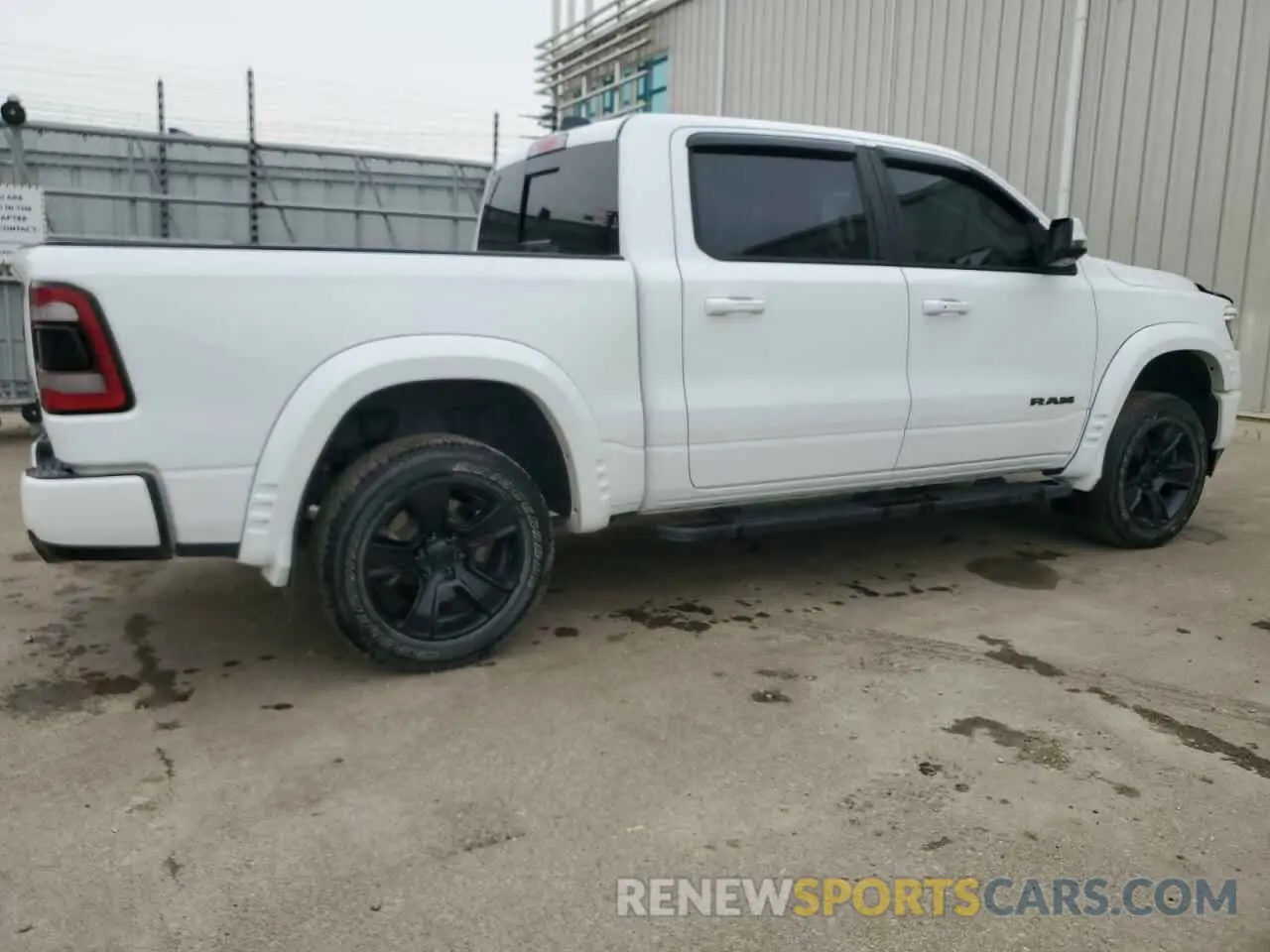 3 Photograph of a damaged car 1C6SRFVT8PN691349 RAM 1500 2023