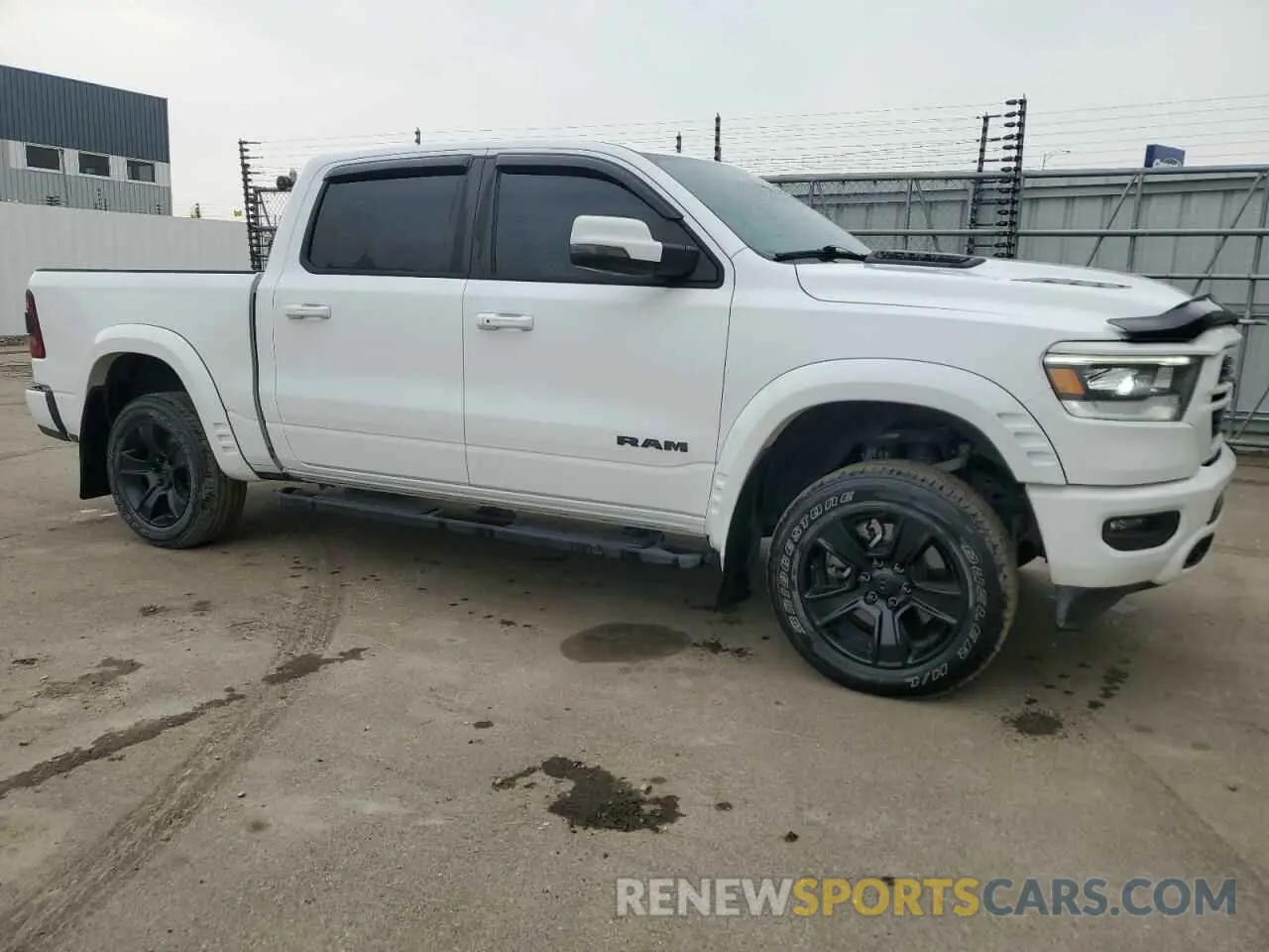 4 Photograph of a damaged car 1C6SRFVT8PN691349 RAM 1500 2023