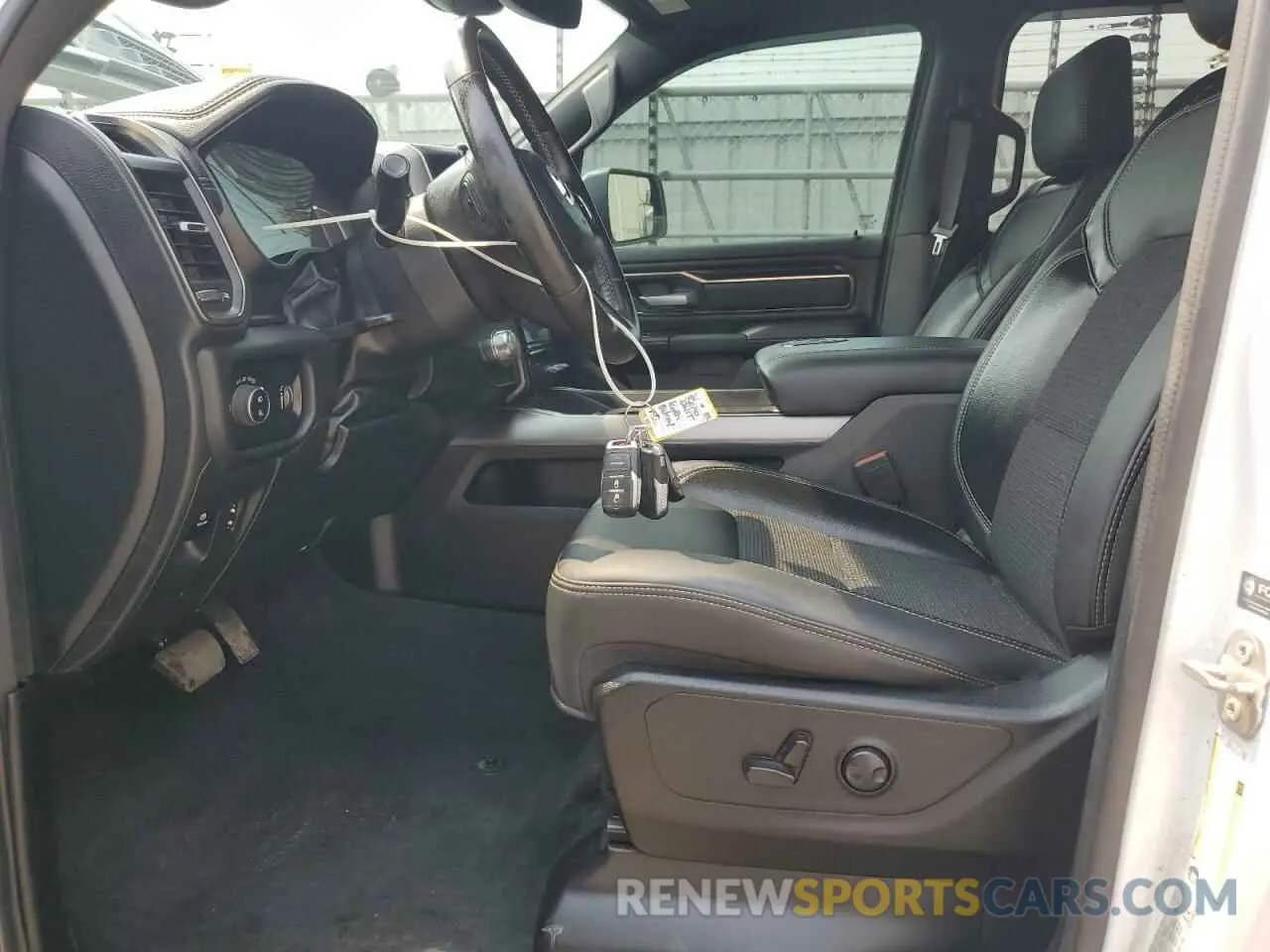 7 Photograph of a damaged car 1C6SRFVT8PN691349 RAM 1500 2023
