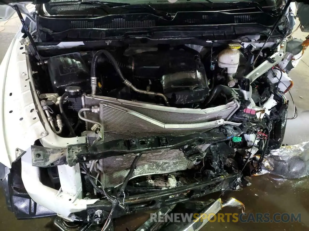 11 Photograph of a damaged car 3C6JR6DG3PG660793 RAM 1500 2023