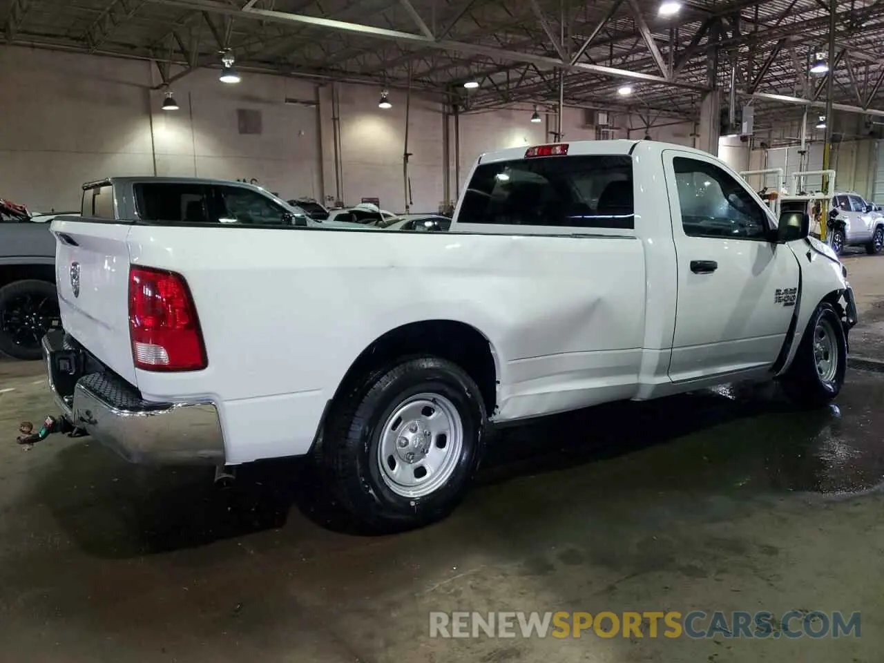 3 Photograph of a damaged car 3C6JR6DG3PG660793 RAM 1500 2023