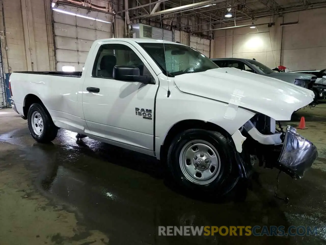 4 Photograph of a damaged car 3C6JR6DG3PG660793 RAM 1500 2023