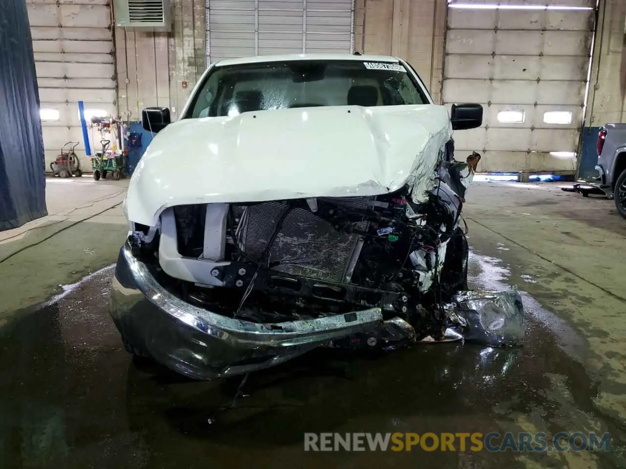 5 Photograph of a damaged car 3C6JR6DG3PG660793 RAM 1500 2023