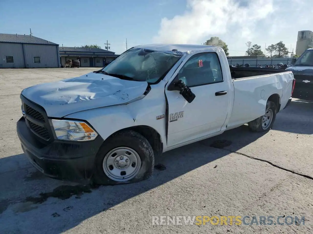 1 Photograph of a damaged car 3C6JR6DT0PG674339 RAM 1500 2023