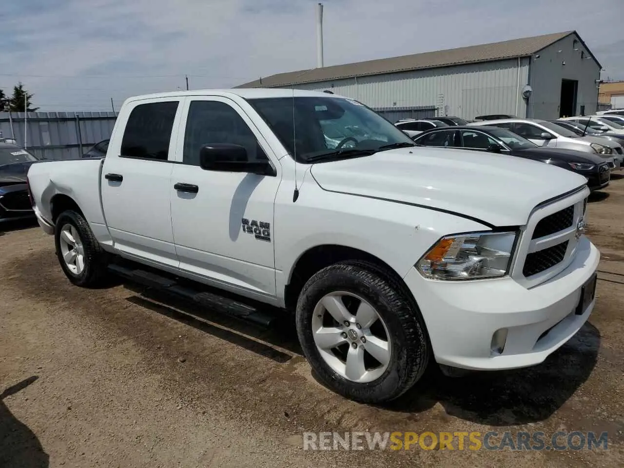 4 Photograph of a damaged car 3C6RR7KG0PG661959 RAM 1500 2023