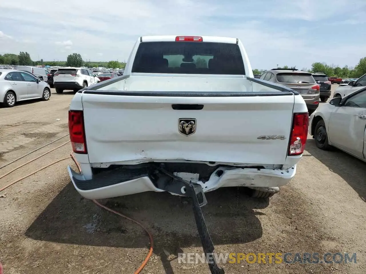 6 Photograph of a damaged car 3C6RR7KG0PG661959 RAM 1500 2023
