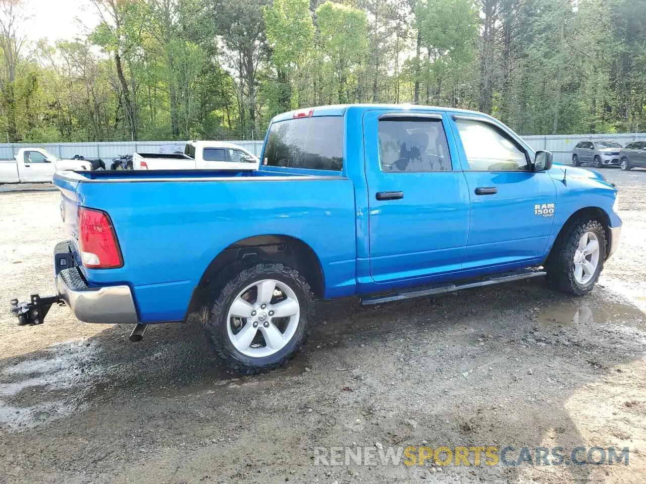3 Photograph of a damaged car 3C6RR7KG3PG663902 RAM 1500 2023