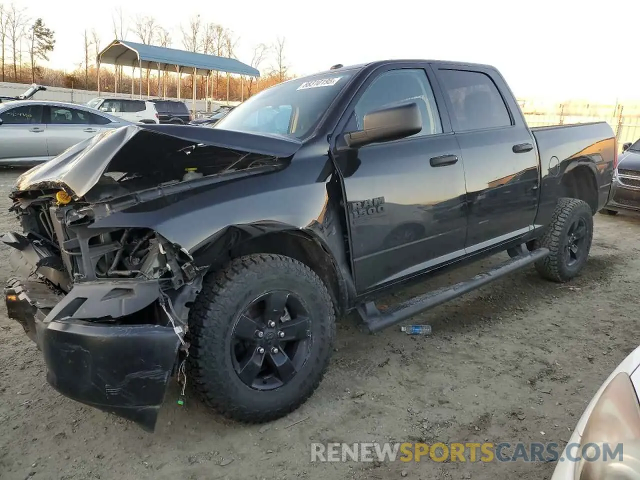 1 Photograph of a damaged car 3C6RR7KGXPG647843 RAM 1500 2023