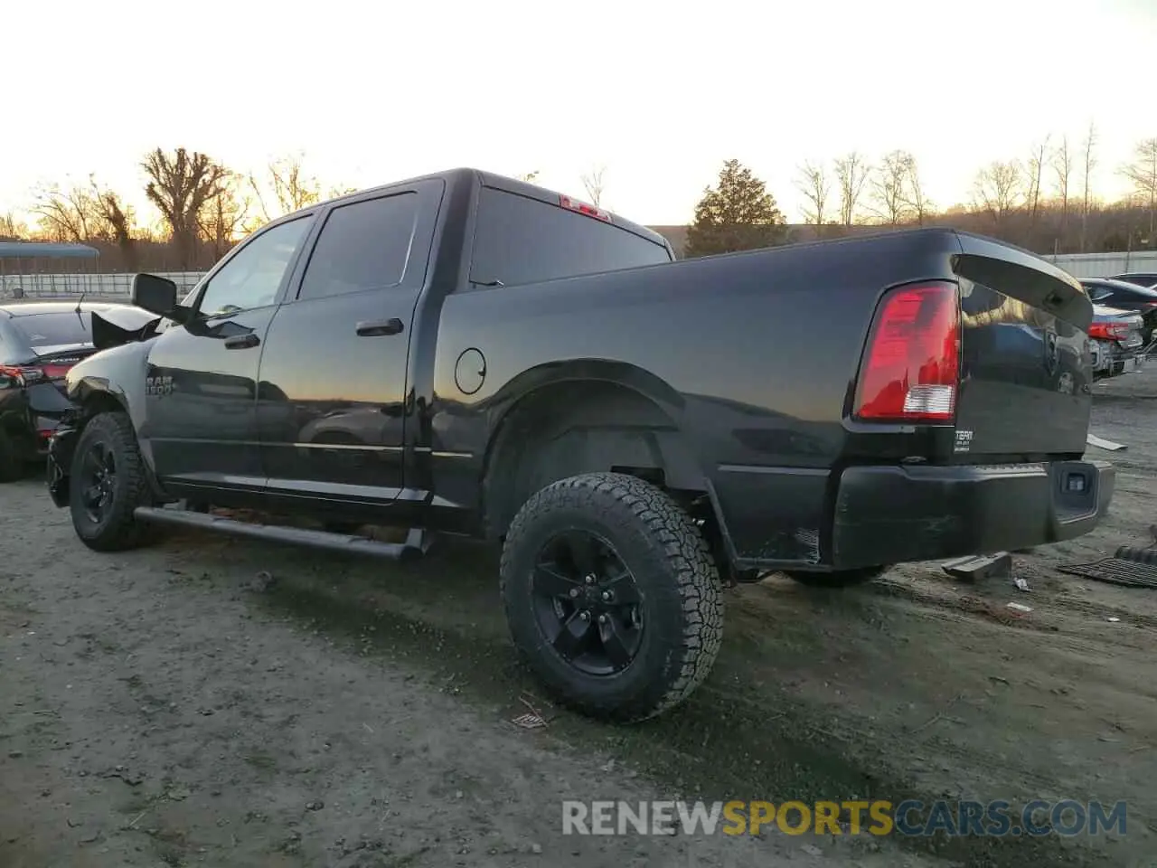 2 Photograph of a damaged car 3C6RR7KGXPG647843 RAM 1500 2023
