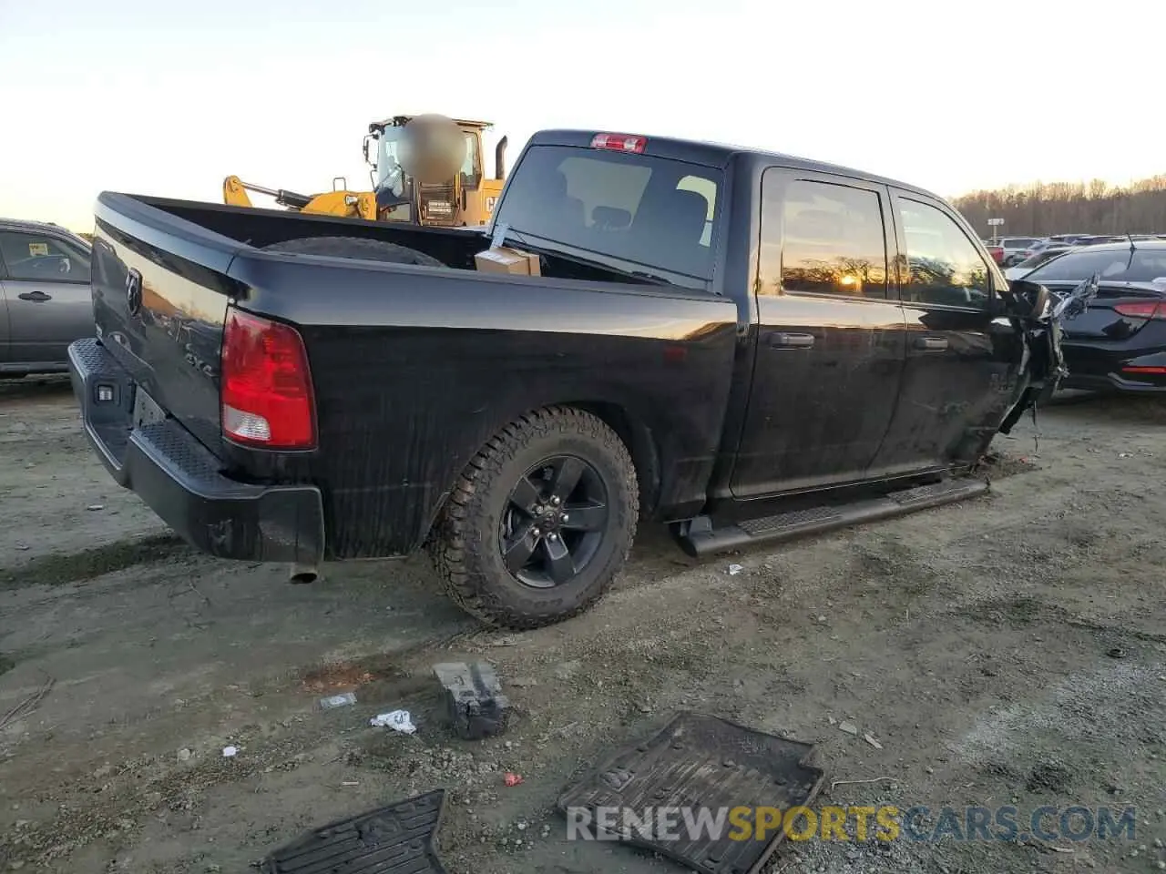 3 Photograph of a damaged car 3C6RR7KGXPG647843 RAM 1500 2023