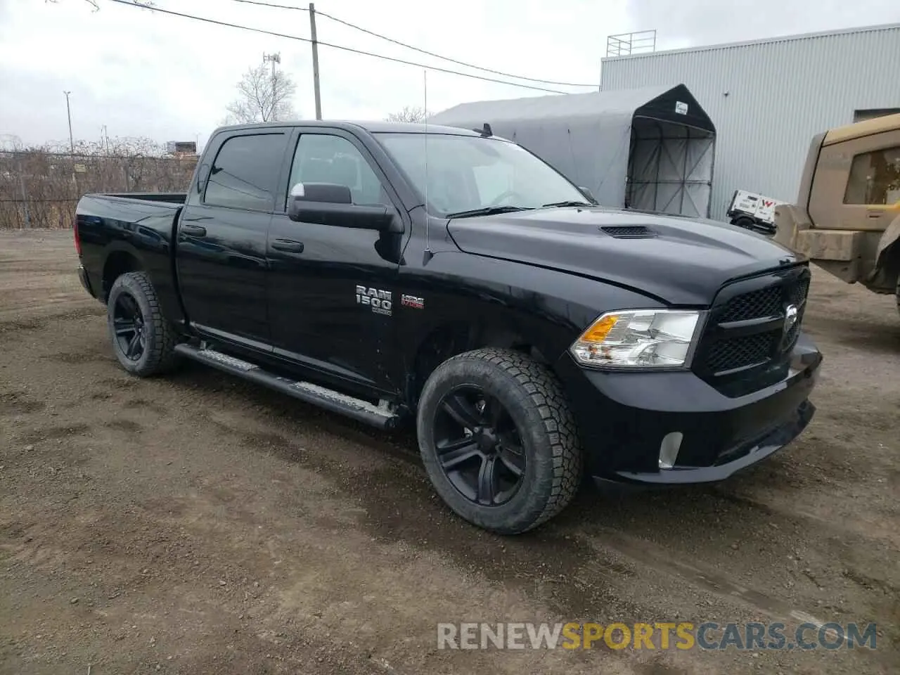 4 Photograph of a damaged car 3C6RR7KT2PG669929 RAM 1500 2023