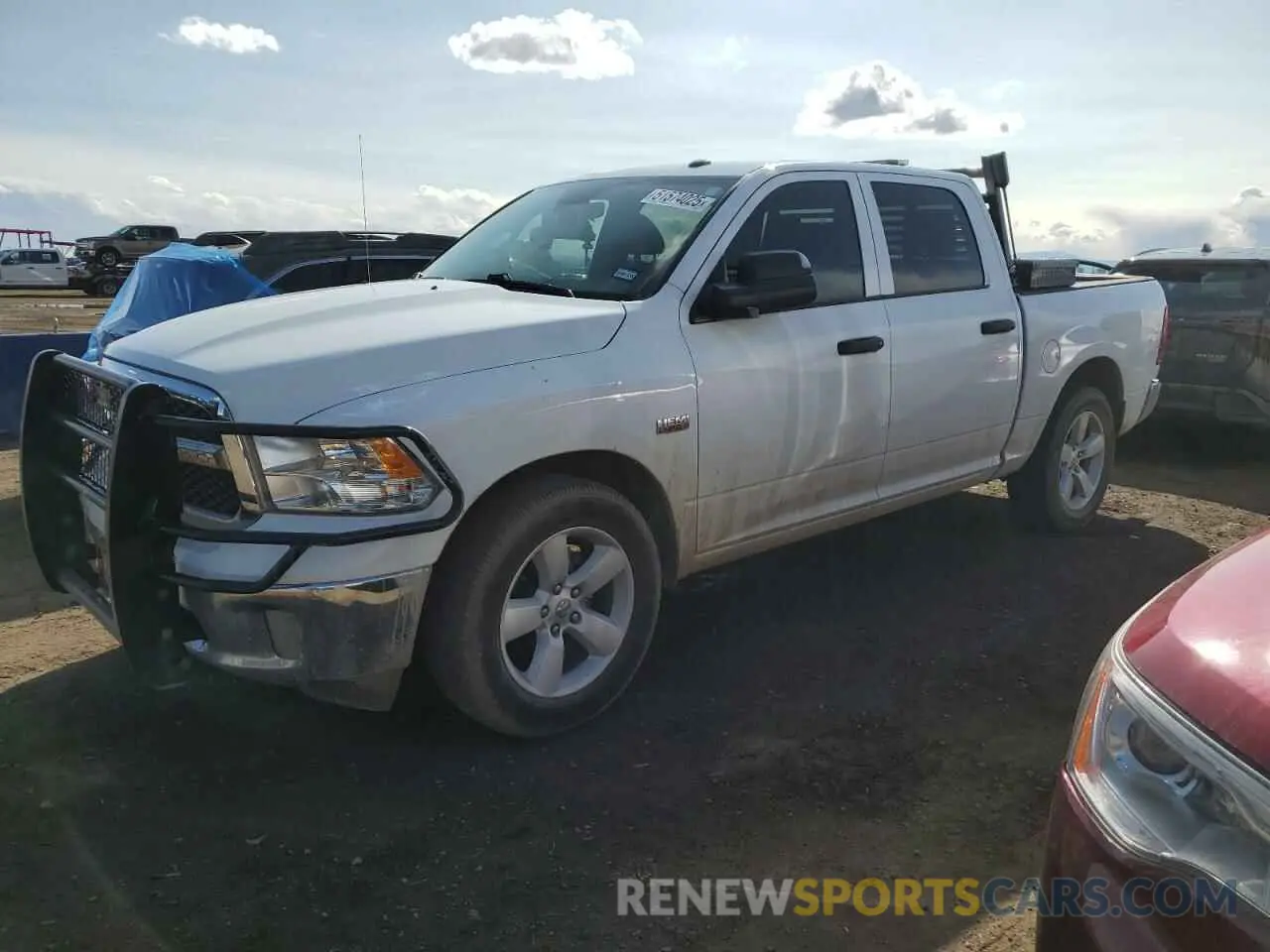 1 Photograph of a damaged car 3C6RR7KTXPG669368 RAM 1500 2023