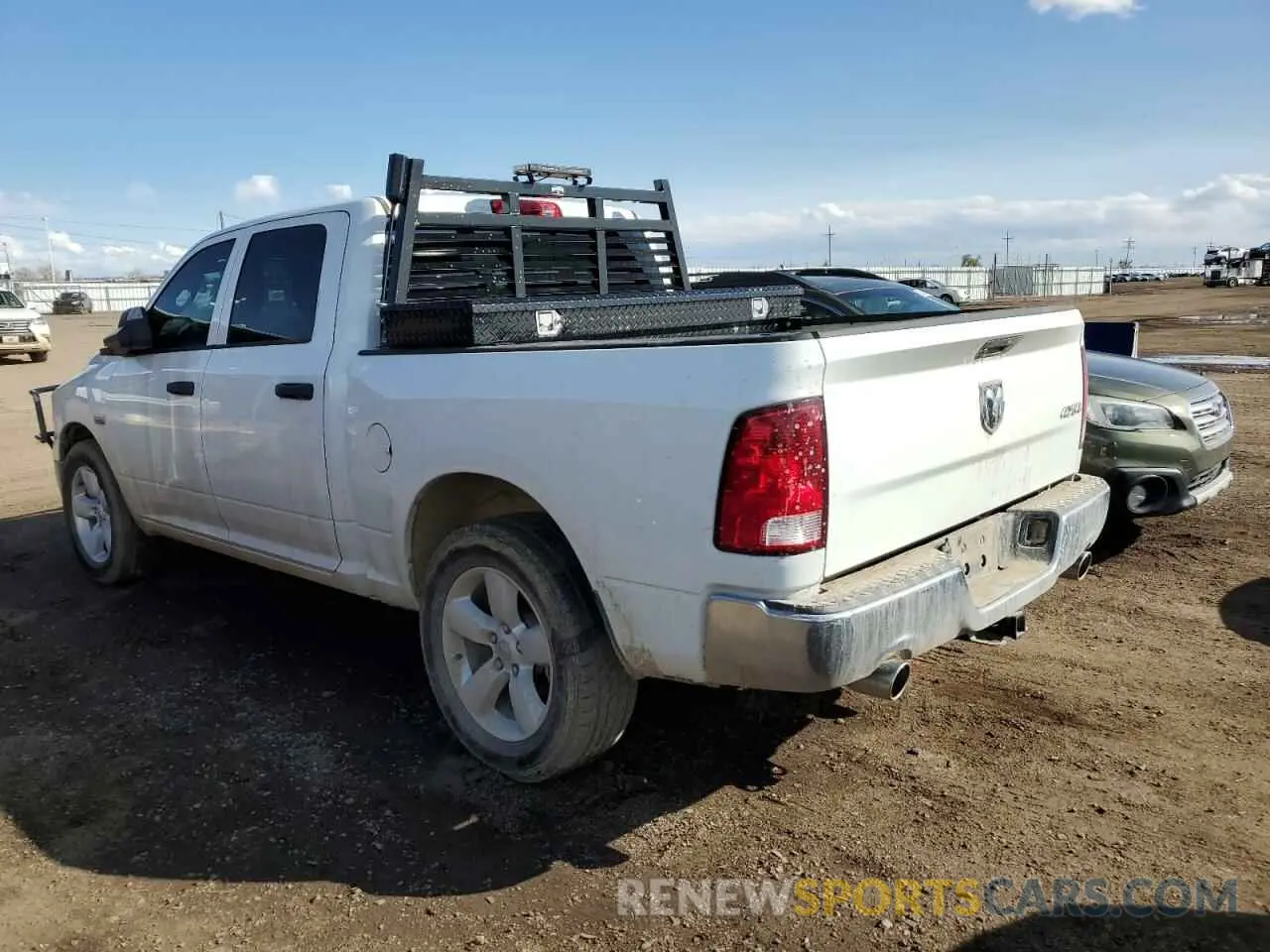 2 Photograph of a damaged car 3C6RR7KTXPG669368 RAM 1500 2023