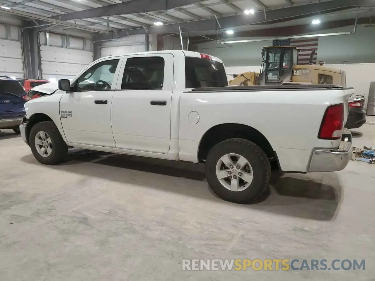 2 Photograph of a damaged car 3C6RR7LG9PG661425 RAM 1500 2023