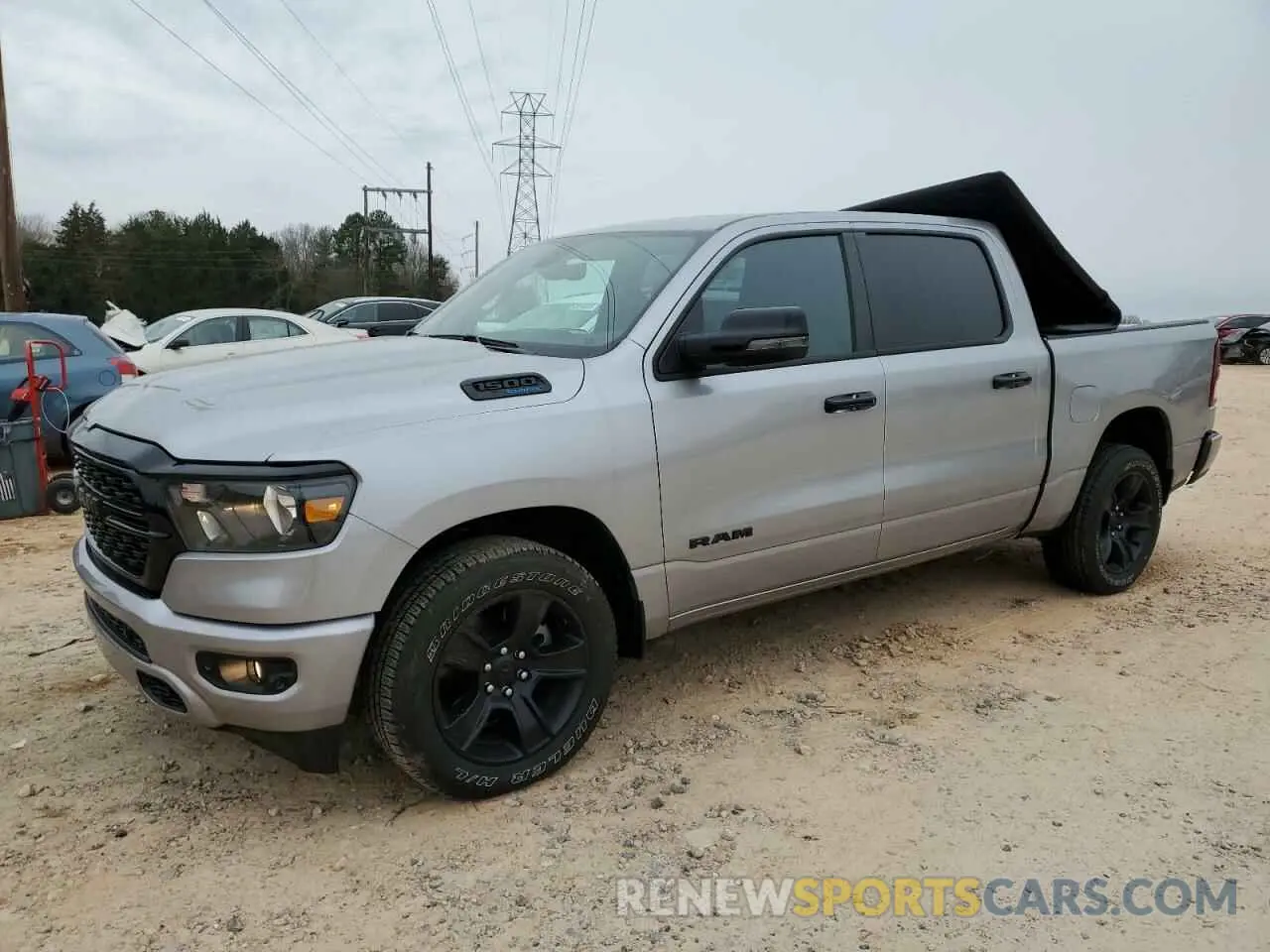 1 Photograph of a damaged car 1C6RREFT1RN122661 RAM 1500 2024