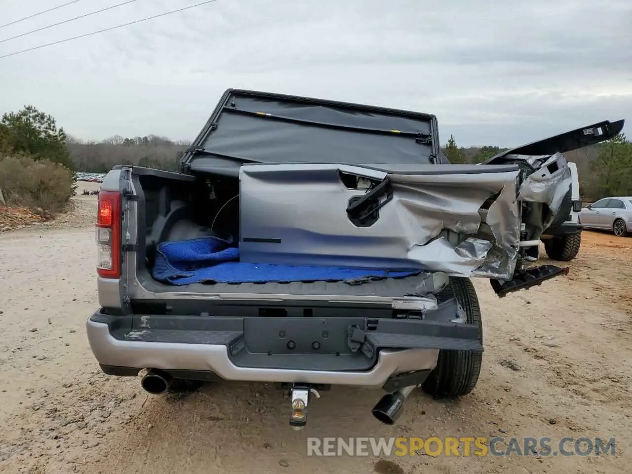 6 Photograph of a damaged car 1C6RREFT1RN122661 RAM 1500 2024